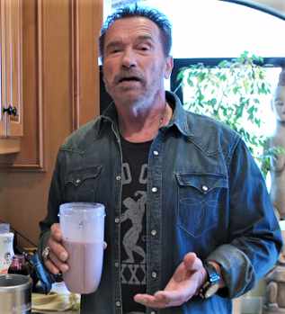 Arnold Schwarzenegger makes a protein shake.
