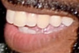 Picture of Omari Hardwick teeth and smile