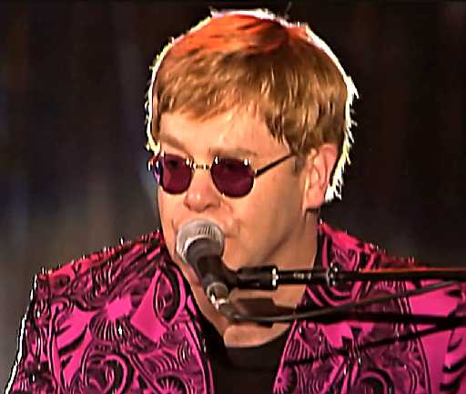 An mage of Elton John playing Candle in the Wind at Madison Square Garden in 2000
