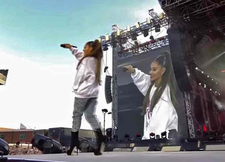 Ariana Grande performing at the 