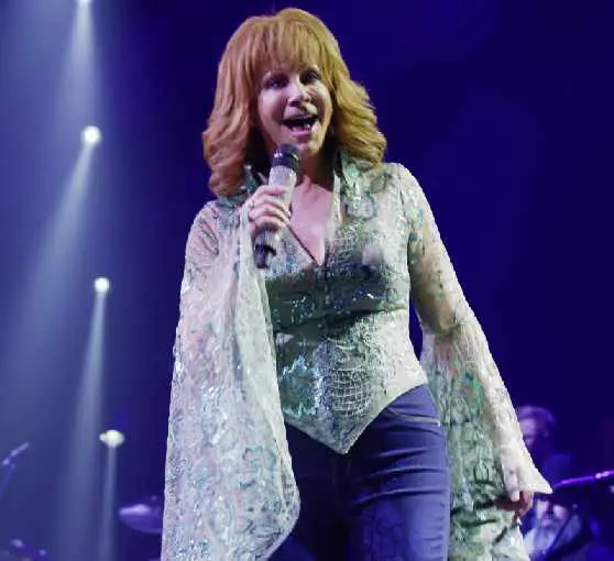 This is a picture of Reba McEntire on stage at Madison Square Garden